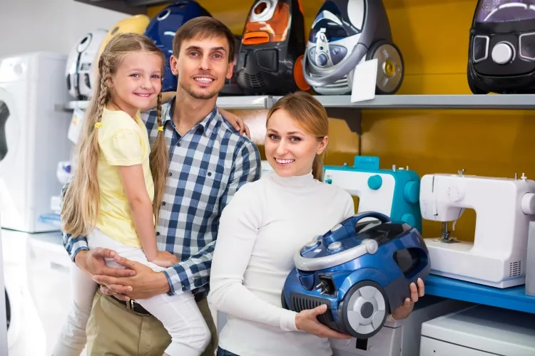 How do I empty a Shark vacuum cleaner?